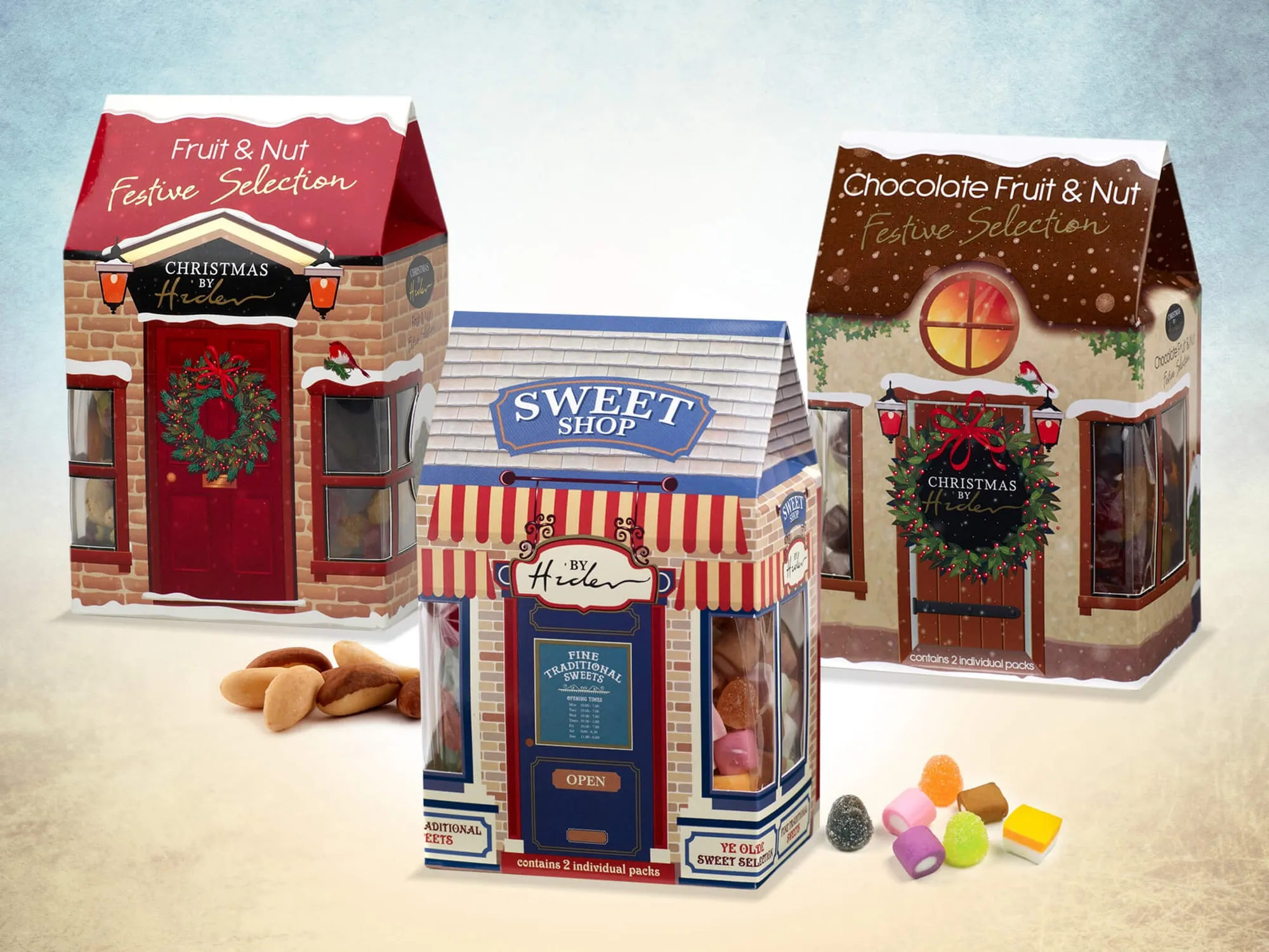 Christmas by Hider festive selection boxes shaped like little shops and houses.