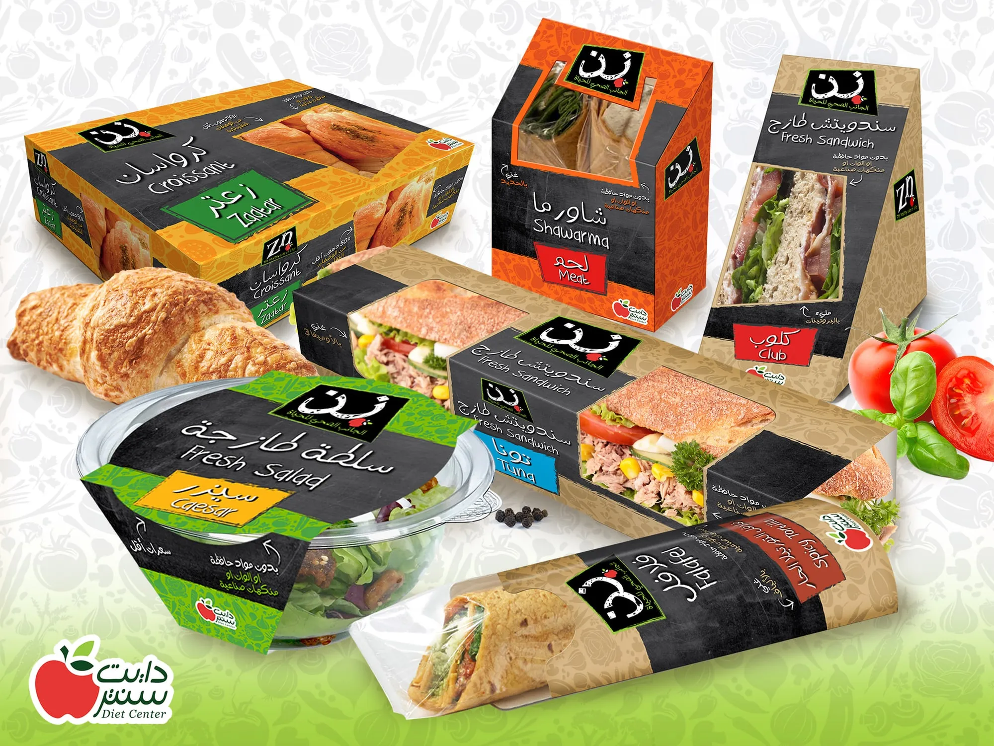 Sandwich, wrap, salad and croissant packs with Arabic and English labels.