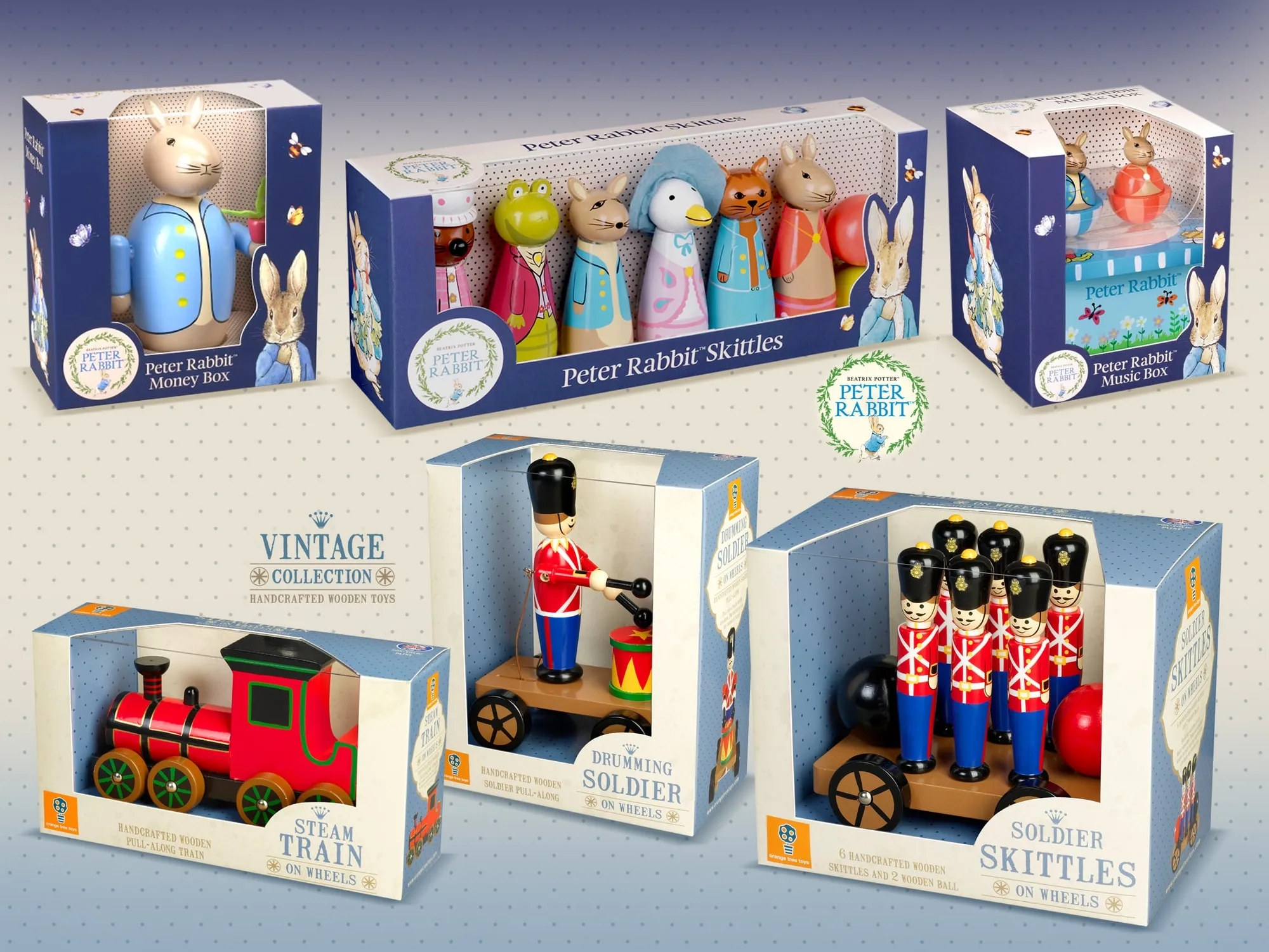 Peter Rabbit and vintage collection wooden toy boxes, with drumming soldier and steam train.